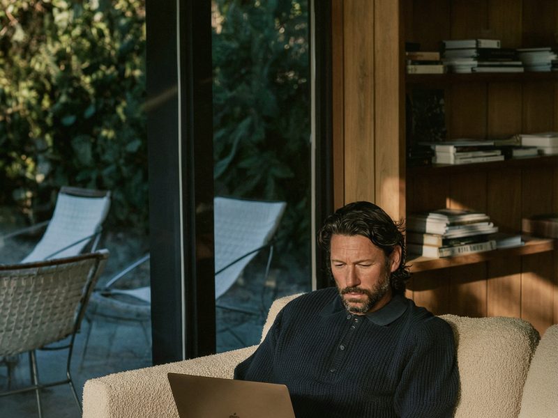 Patient on a laptop in a sunlit room